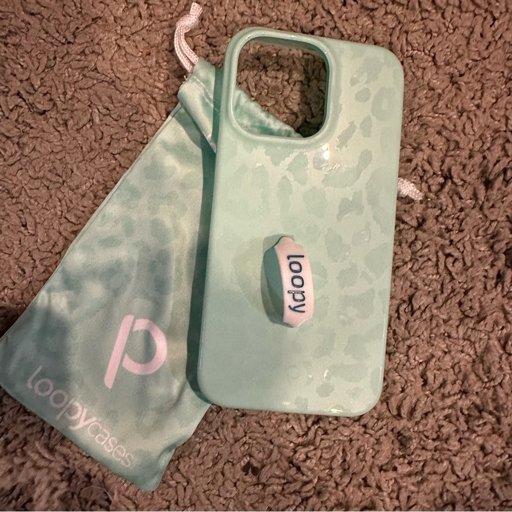 Loopy case for iPhone 14 Pro Max in Mint Leopard.